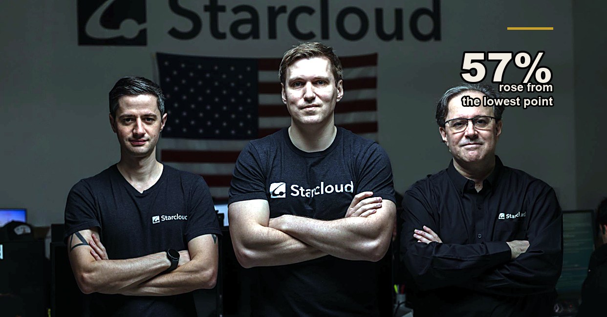 The 3 founders of Starcloud standing with arms crossed in front of a dark wall with the Starcloud logo and a US flag, computer monitors glowing behind them.