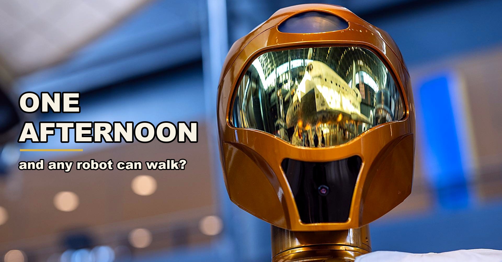 NASA's Robonaut 2 humanoid robot, with the Space Shuttle Discovery reflected in its gold visor